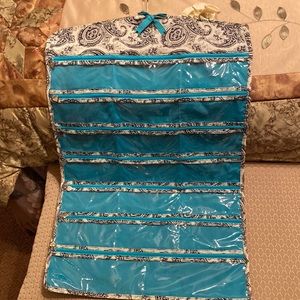 Double-sided zippered jewelry bag with hook